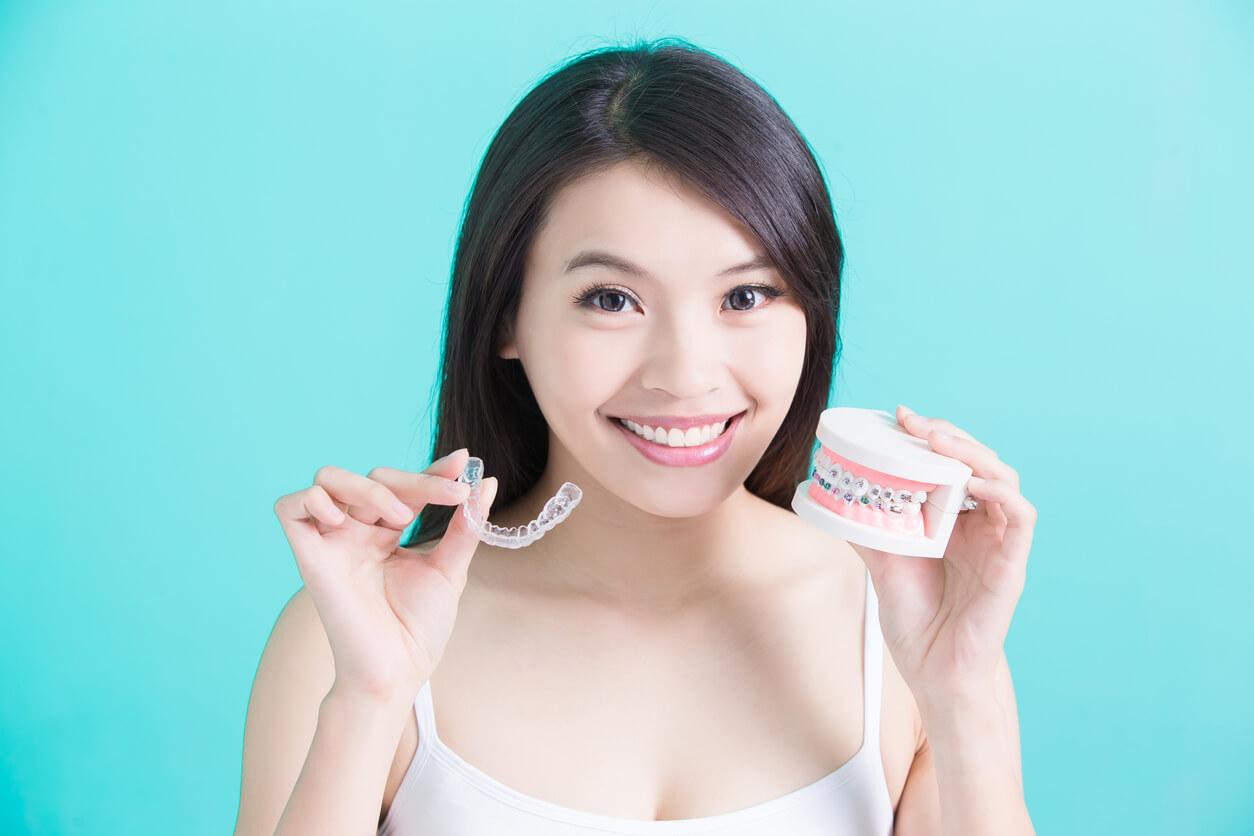 Woman Choosing ClearCorrect Aligners Over Traditional Braces